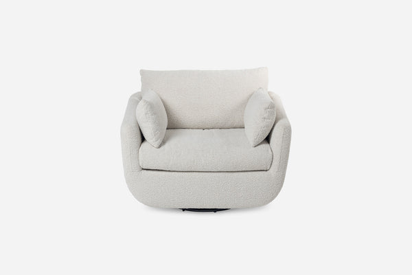 front view of the park swivel armchair in quartz bouclé